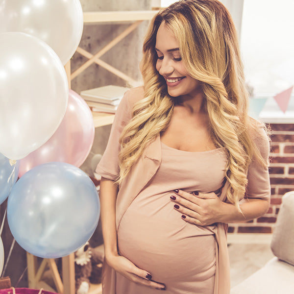 Decorate a baby shower with sola wood flowers