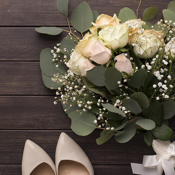 Stunning aisle with wood wedding flowers